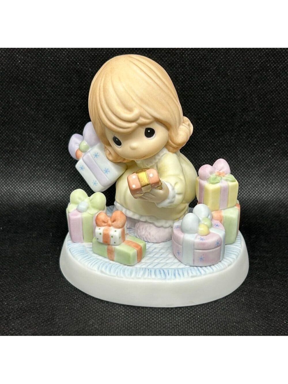 Precious Moments "A Tiny Tot With Her Eyes All Aglow" figurine